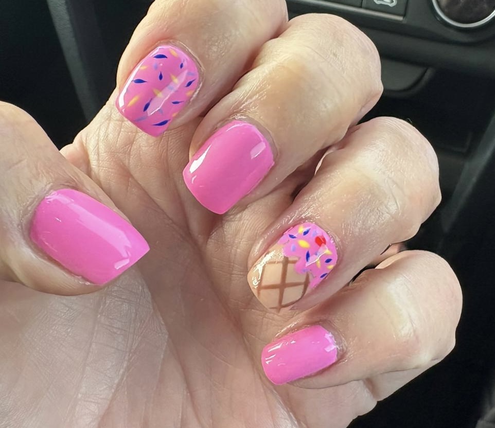 Pink nails with ice cream cone nail art