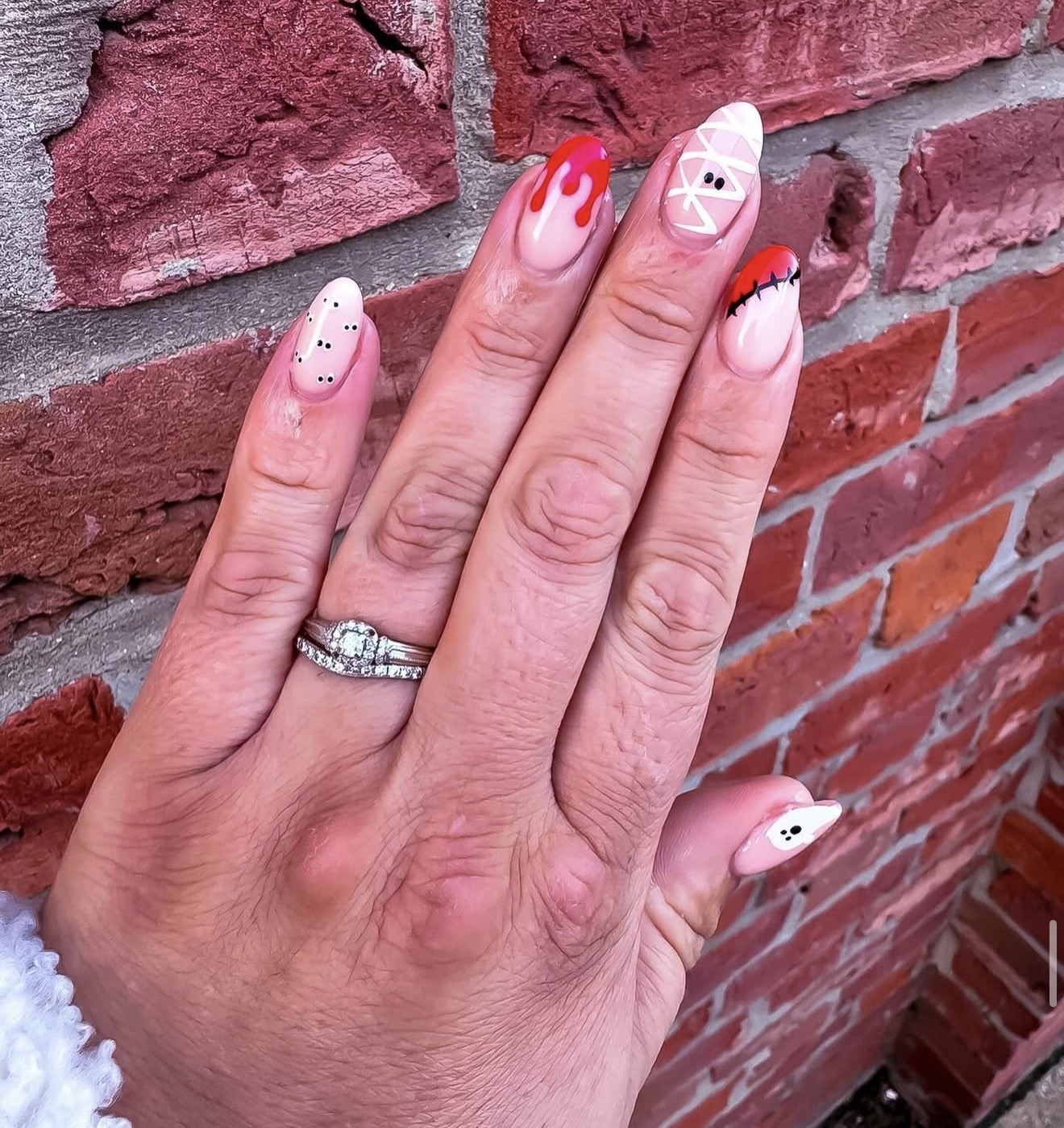 White and pink Halloween ghost nails