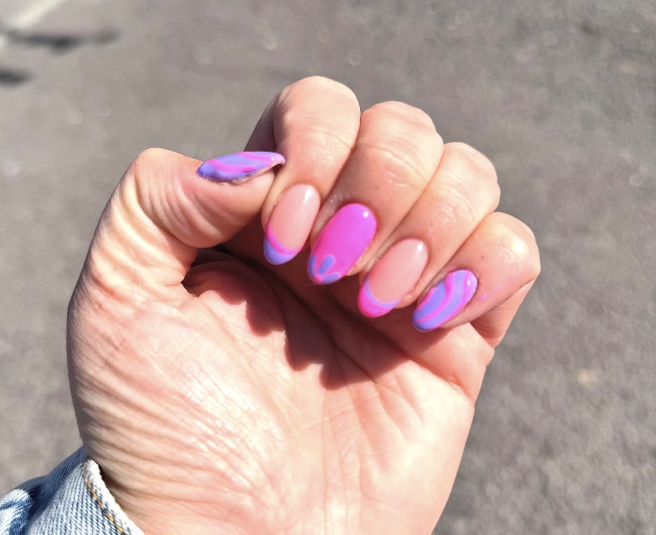 Pink and purple swirl nails